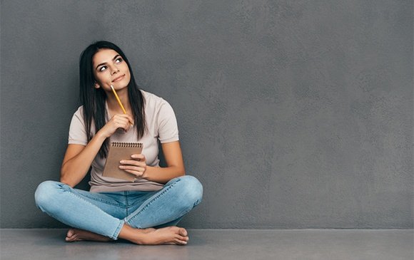 Woman sitting and thinking